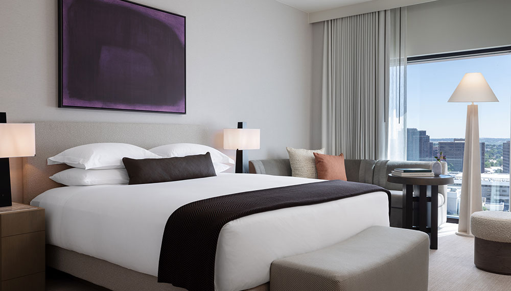 King Spa City View guest room at Kimpton Claret Hotel