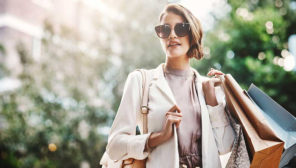 Chic woman with shopping bags