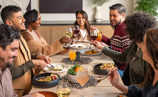 group of people dining at Kimpton Claret Private Dining Room