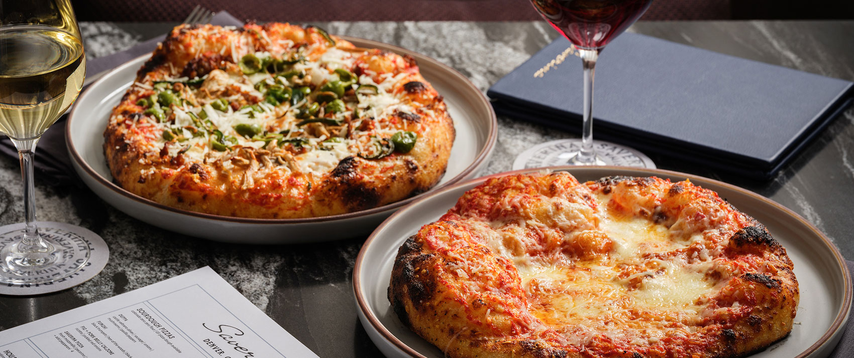 2 Pizzas and glasses of wine at Saverina